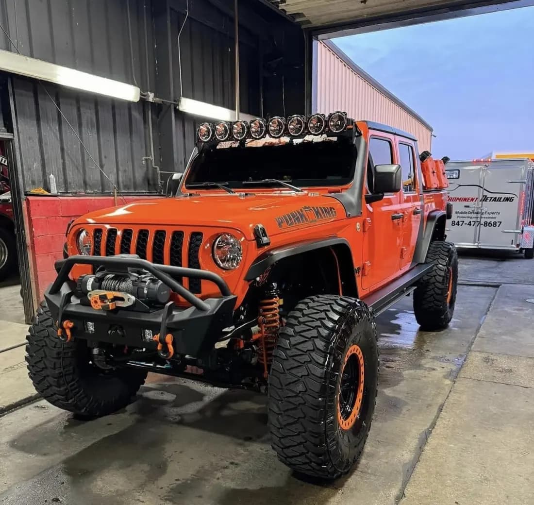 Lifted orange Jeep Gladiator build detailed in Vernon Hills